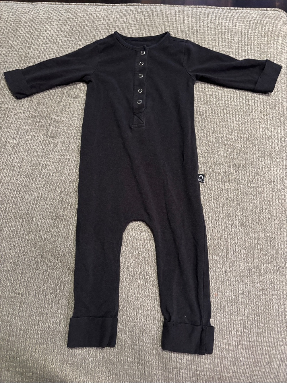 Rags to Raches Black Snap-Front Baby One-Piece